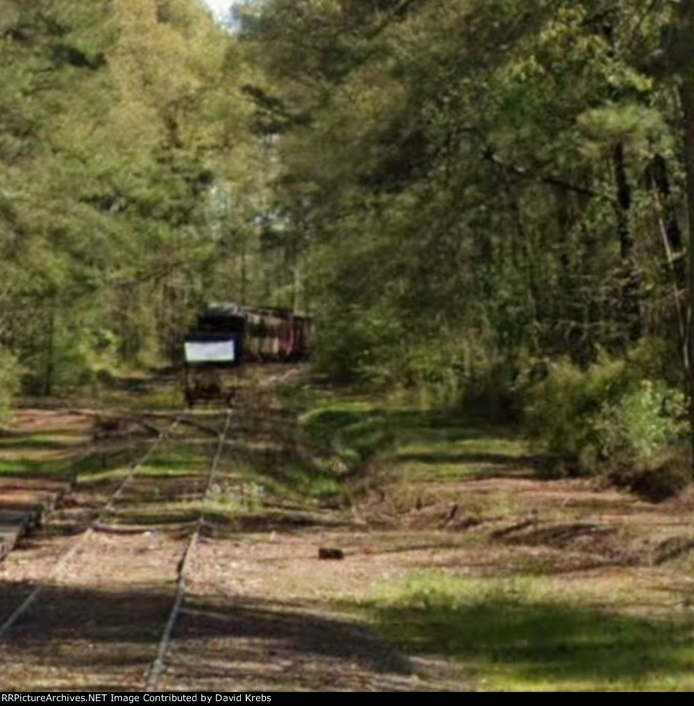 Rolling stock up in the woods.